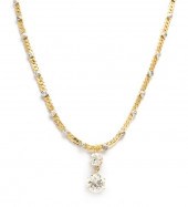 An 18 Karat Yellow Gold and Di