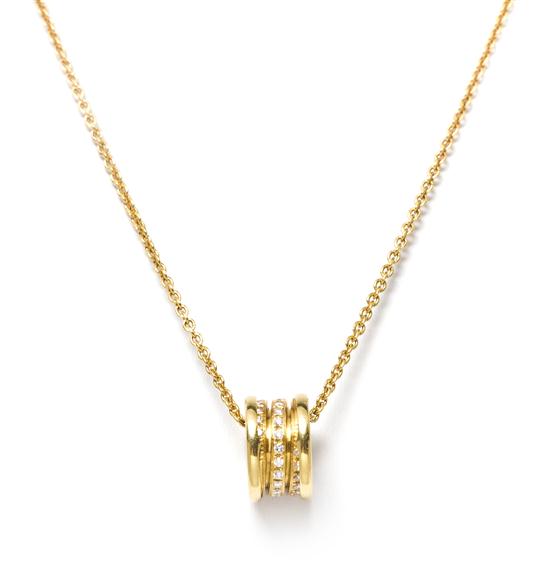 An 18 Karat Yellow Gold and Diamond