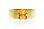 An 18 Karat Yellow Gold and Ci