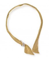 *An 18 Karat Yellow Gold Plati