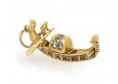 An 18 Karat Yellow Gold and Aq