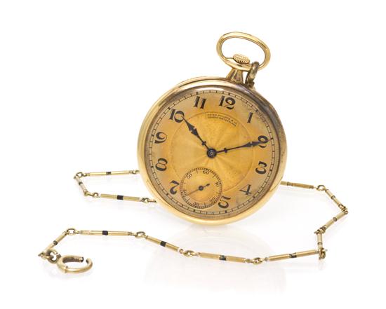 *An 18 Karat Yellow Gold Open