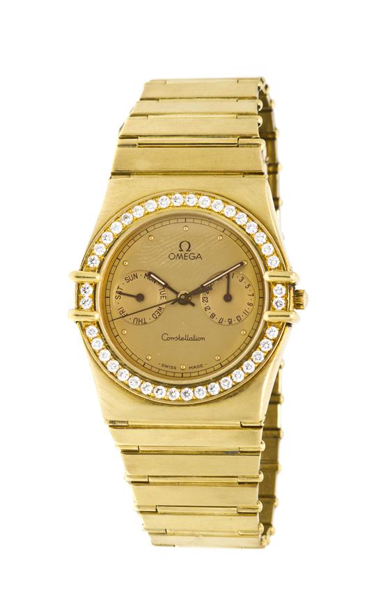 An 18 Karat Yellow Gold and Diamond