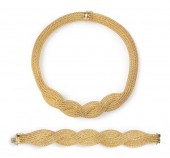 An 18 Karat Yellow Gold Demi P