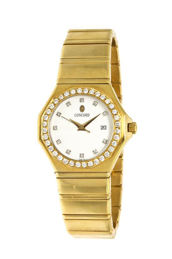 An 18 Karat Yellow Gold and Diamond