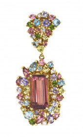 An 18 Karat Yellow Gold and Mu