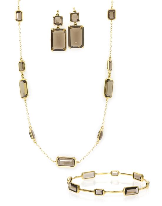 An 18 Karat Yellow Gold Smoky