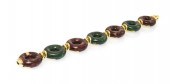 An 18 Karat Yellow Gold and Po