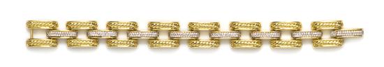 An 18 Karat Yellow Gold and Diamond