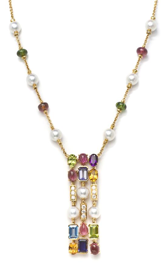 An 18 Karat Yellow Gold Diamond and