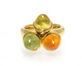 An 18 Karat Yellow Gold and Mu