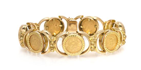 An 18 Karat Yellow Gold and Mexican