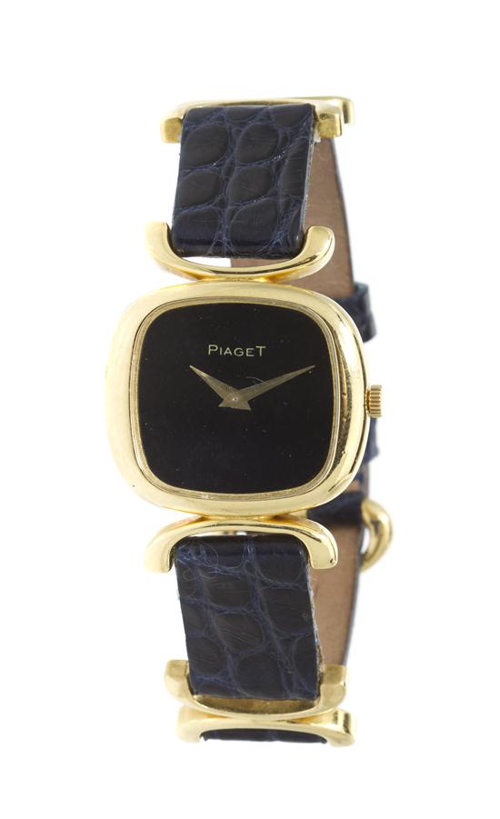 An 18 Karat Yellow Gold