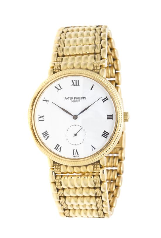 An 18 Karat Yellow Gold Ref. 3919