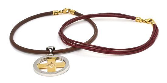 An 18 Karat Yellow Gold and Steel