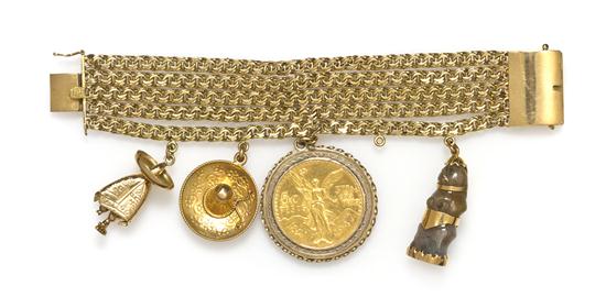 An 18 Karat Yellow Gold Multi