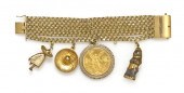 An 18 Karat Yellow Gold Multi