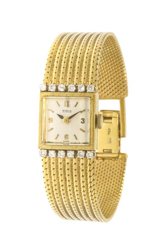 An 18 Karat Yellow Gold and Diamond
