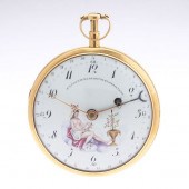 AN 18 KARAT YELLOW GOLD AND PO