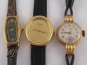 An 18ct gold ladys wrist watch