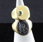 An 18ct gold signet ring inset