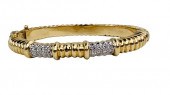 AN 18K DIAMOND BANGLE BRACELET