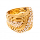 AN 18K DIAMOND PAVE WIDE BAND