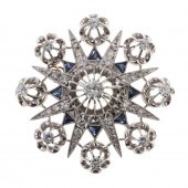 AN 18K DIAMOND & SAPPHIRE STAR