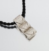 An 18k Gold and Diamond Pendan
