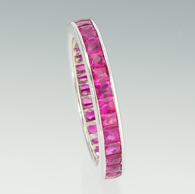 An 18k Gold and Ruby Eternity