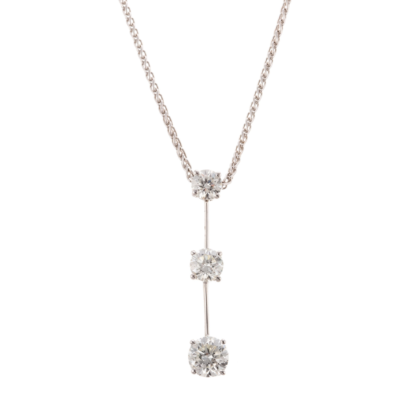 AN 18K THREE DIAMOND PENDANT BY
