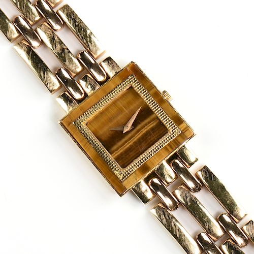 AN 18K YELLOW GOLD AND TIGER'S