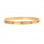 AN 18K YELLOW GOLD CARTIER LOV