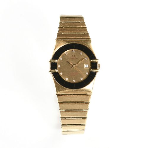 AN 18K YELLOW GOLD DIAMOND FACE