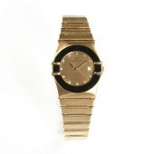 AN 18K YELLOW GOLD DIAMOND FAC