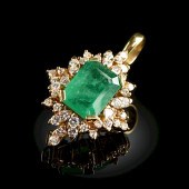 AN 18K YELLOW GOLD, EMERALD, A