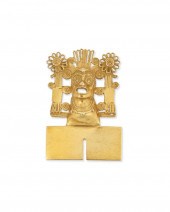 AN 18K YELLOW GOLD PRE-COLOMBI
