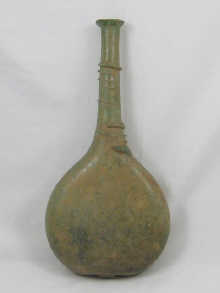 An 18th century green glass Persian