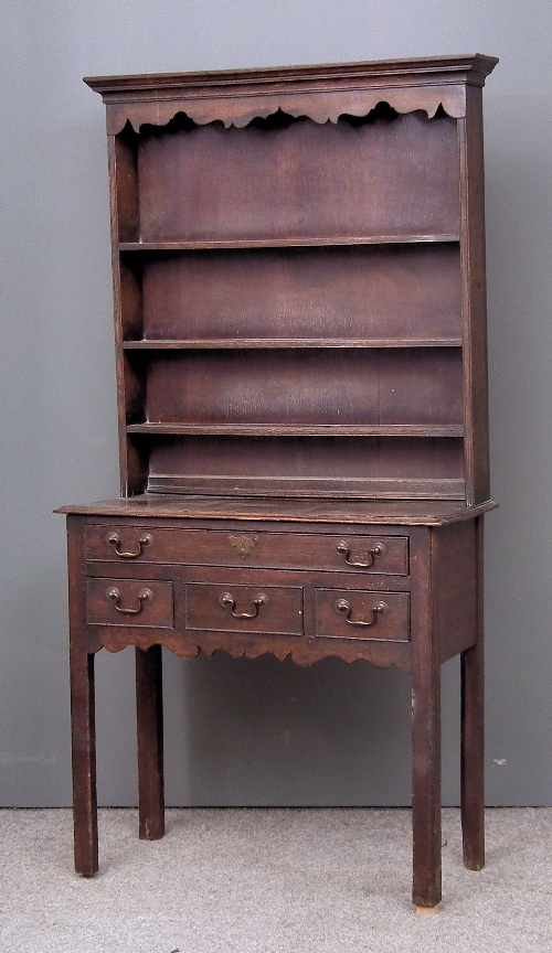 An 18th Century oak lowboy the