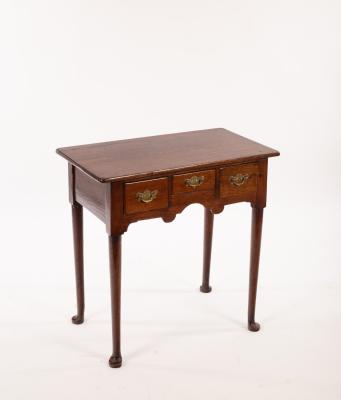 An 18th Century oak lowboy, on