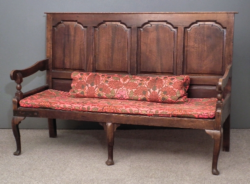 An 18th Century oak settle the back