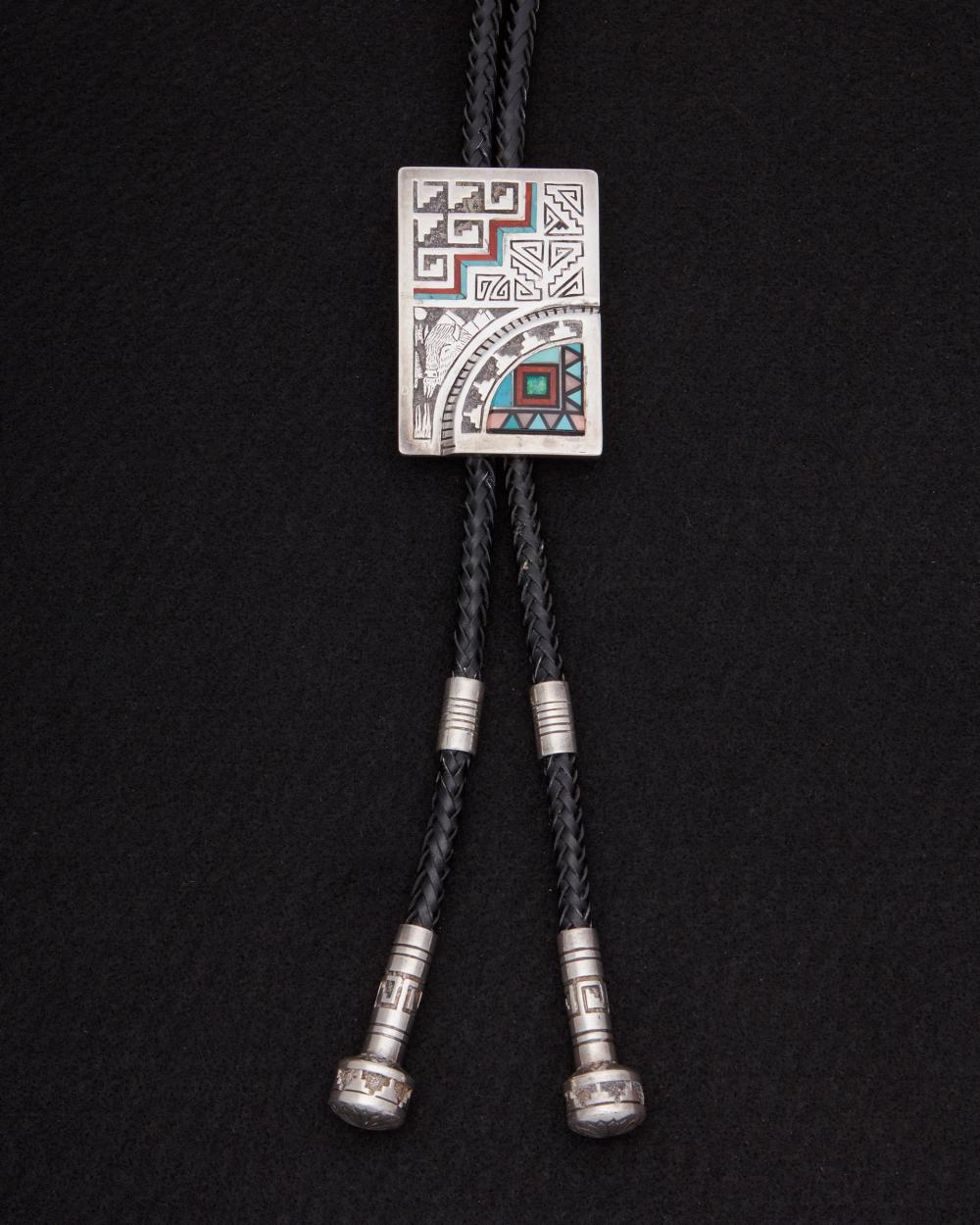 AN ABRAHAM BEGAY INLAID SANDCAST