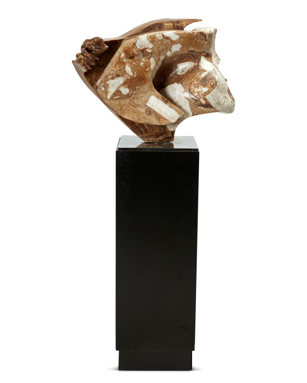 AN ABSTRACT CARVED STONE