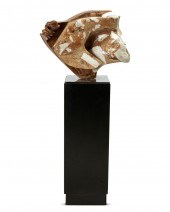 AN ABSTRACT CARVED STONE SCULP