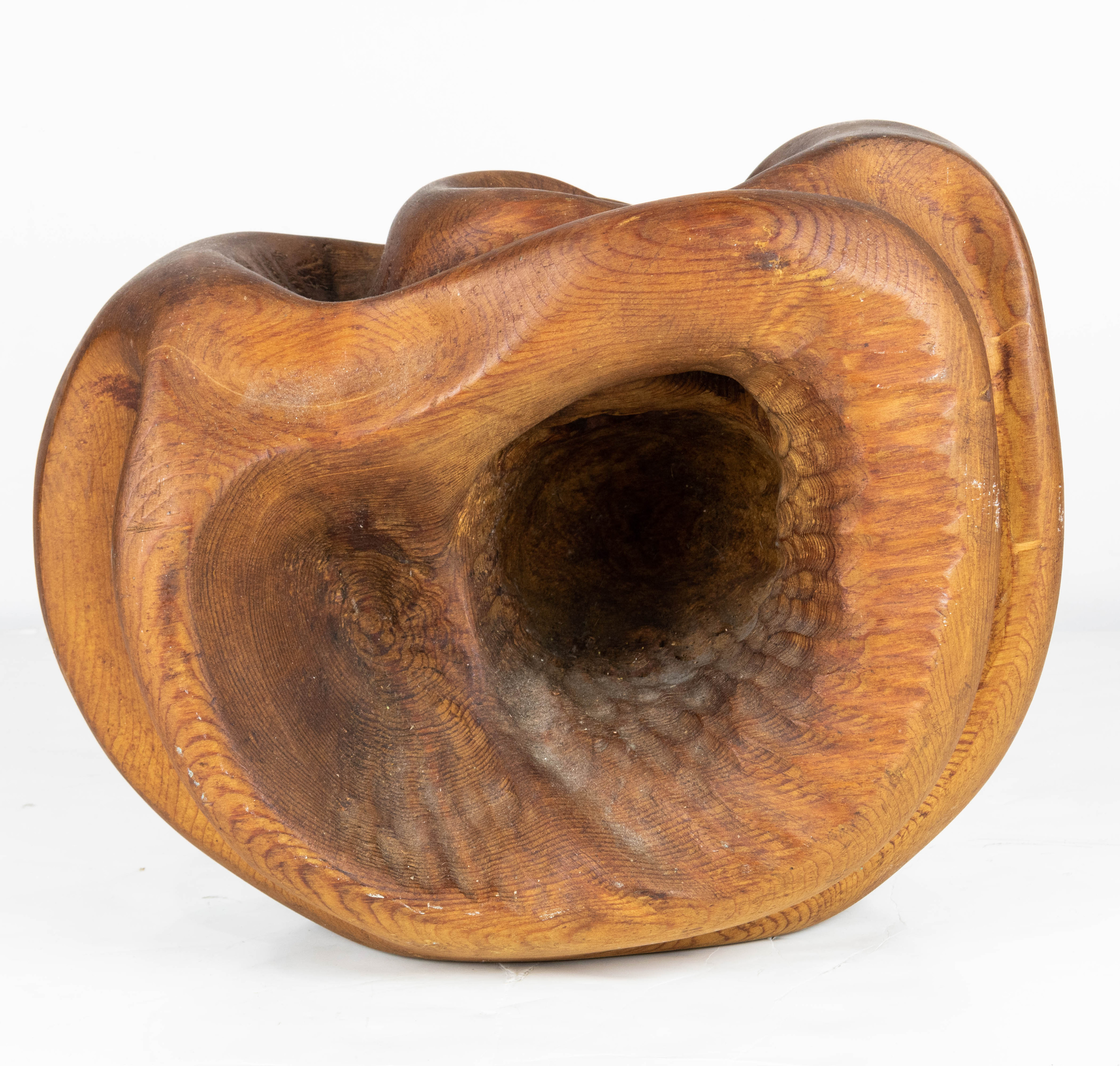 AN ABSTRACT GEOMETRIC CARVED WOOD