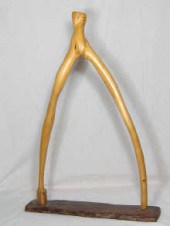 An abstract wood sculpture sig