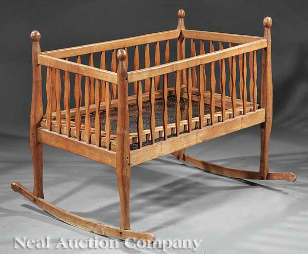 An Acadian Carved Cypress Cradle