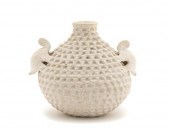 An Acoma Corrugated Effigy Pot