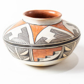 AN ACOMA POT, THE COMPRESSED O