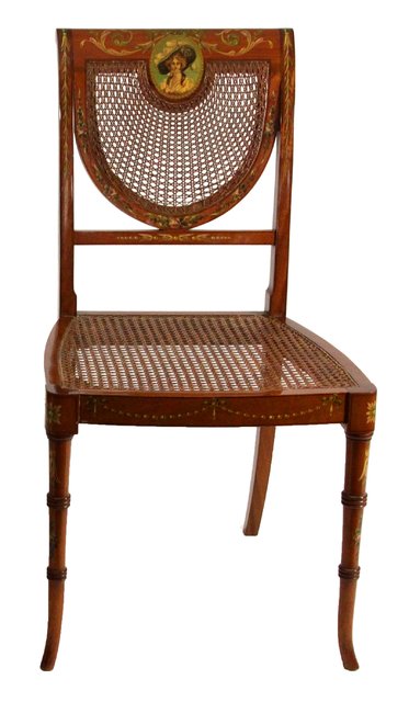 An Adam style painted and decorated